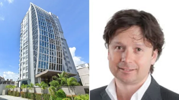 На складеному зображенні зображено житловий комплекс та Квентіна Гріффіта.