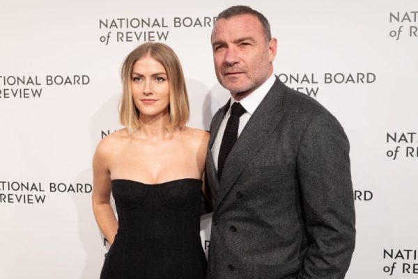 Liev Schreiber (R) and his wife Taylor Neisen arrive on the red carpet for the National Board of Review Gala in New York City in January. Schreiber voices Sam Fisher in a new trailer for Netflix's animated 