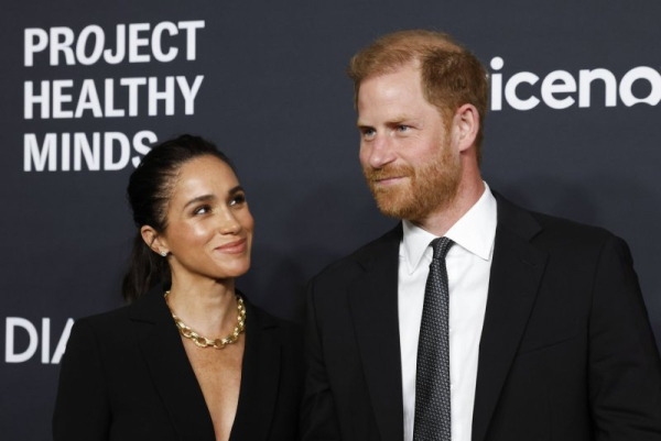 Co-Founders of The Archewell Foundation and Project Healthy Minds' Humanitarians of the Year Award recipients Prince Harry and Meghan, Duke and Duchess of Sussex, arrive on the red carpet at the third annual World Mental Health Day Gala on Thursday. Photo by John Angelillo/UPI