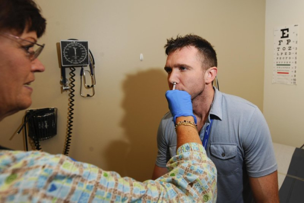 Adrenaline delivered with liquid or powder nasal sprays is as effective, and sometimes even better, than injected adrenaline, an evidence review found. File Photo by Tannen Maury/EPA