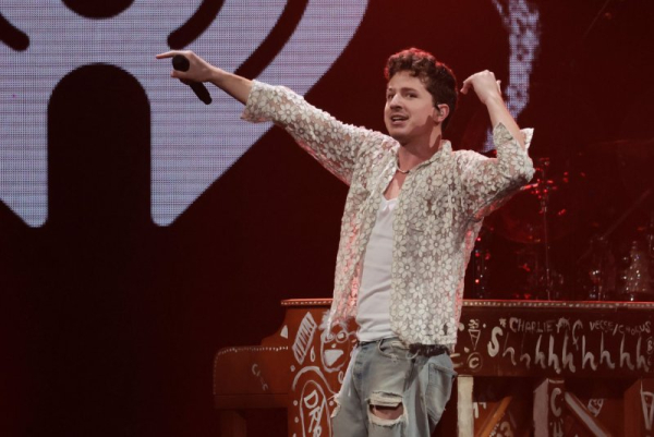 Charlie Puth performs at the Y100 iHeartRadio Jingle Ball concert in 2022. He discussed his baby news on 