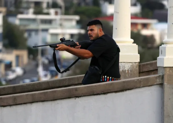 Підозрюваний у злочині на пляжі Бонді Навід Акрам вперше з'явився перед судом після Хануки. 2