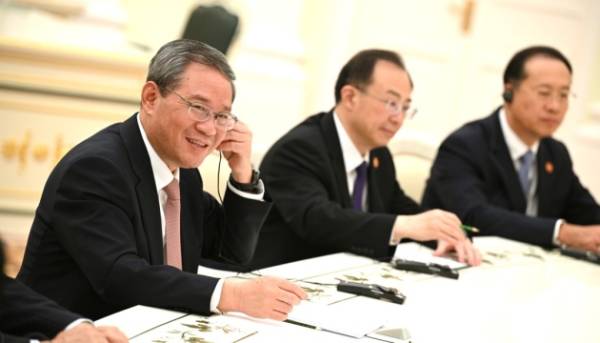 Китайський прем'єр повідомив про річний приріст економіки в 5%. 7 Китайський прем'єр повідомив про річний приріст економіки в 5%. 7